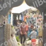 A Busy Marketplace characterized by a Narrow, Arched Entrance Leading into a Crowded Area - Log, colour and B&W