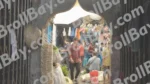 A Busy Marketplace characterized by a Narrow, Arched Entrance Leading into a Crowded Area - Log, colour and B&W