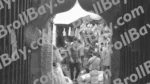 A Busy Marketplace characterized by a Narrow, Arched Entrance Leading into a Crowded Area - Log, colour and B&W - Image 2