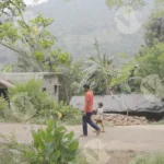 A Man or a Boy Walk on a Rural Dirt Road - Log, colour and B&W