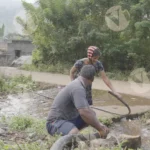 Man is fixing a Pipe - Log, colour and B&W