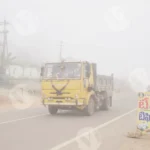 A Road with Moving Vehicles in Foggy Conditions - Log, colour and B&W