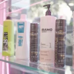 A Shelf with Various hair care Products,  Styling Products - Log, colour and B&W