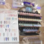 A Display of Nail Polish Colors - Log, colour and B&W
