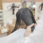 The Barber is using a Comb to Section the Hair - Log, colour and B&W