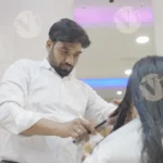 Hairdresser Cutting Hair - Log, colour and B&W