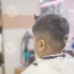 Barber Cutting Boy's Hair with Trimmer - Log, colour and B&W