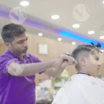 Man Cutting Boy Hair - Log, colour and B&W