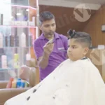 A Boy Getting a Haircut at a Salon - Log, colour and B&W