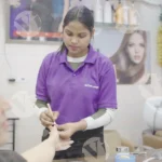 Girl Getting a Manicure - Log, colour and B&W