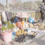 Selling God Statue (Murti) on a Street - Log, colour and B&W