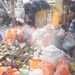 Man is Selling Religious Items on The Bridge - Log, colour and B&W