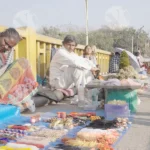 People Selling some Religious Items on Street - Log, colour and B&W