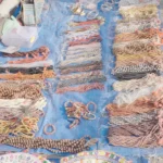 Selling some Locket and Necklace on Street - Log, colour and B&W