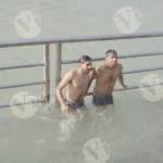 Two Boys Taking Bath in Hooghly river - Log, colour and B&W