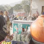 Boy Making Soda - Log, colour and B&W