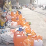 Haridwar Local Bottle Shop - Log, colour and B&W