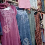 Selling Ladies Suits in Market - Log, colour and B&W