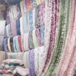 Selling Curtain in a Market - Log, colour and B&W