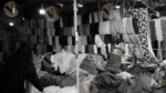 Arranging Clothes in a Shop - Log, colour and B&W - Image 2