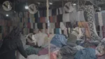 Arranging Clothes in a Shop - Log, colour and B&W - Image 3