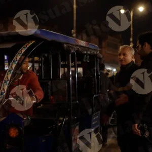 People Traveling in Local Electric Rickshaw - Log colour and B&W