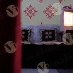 Sofa with Decorative Pillows in a House - Log, colour and B&W