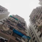 Low-Angle view of Tall Apartment Buildings - Log, colour and B&W