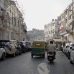 A Street  in Connaught Place - Log, colour and B&W