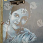 A Woman Art on a Wall - Log, colour and B&W