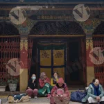 People Setting Front of Monastery - Log, colour and B&W