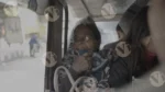 A Old Woman  Setting in a Auto - Log, colour and B&W - Image 3