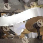 Paper Roll in a Machine - Log, colour and B&W