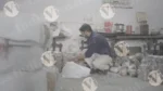 Man Packing Paper Plate - Log, colour and B&W - Image 3