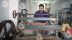 Person use machine to Cutting Paper Plates - Log, colour and B&W