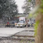Vehicles are Stopped at the Railway Crossing - Log, colour and B&W