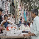 Man Selling Crockery in a Street Market - Log, colour and B&W