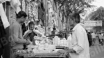 Man Selling Crockery in a Street Market - Log, colour and B&W - Image 2