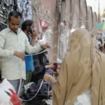 Selling Cloth in a Street Market - Log, colour and B&W