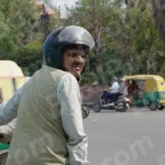 Old Man Waiting on a Scooter - Log, colour and B&W