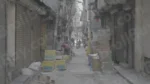 Man packing Things in a Street - Log, colour and B&W - Image 3