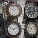 Selling Wall Clocks in a Market - Log, colour and B&W