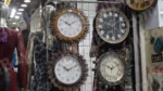 Selling Wall Clocks in a Market - Log, colour and B&W