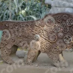 Animal Sculpture Made from Scrap Metal Parts - Log, colour and B&W