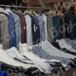 Selling Clothes on a Stall - Log, colour and B&W