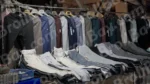 Selling Clothes on a Stall - Log, colour and B&W