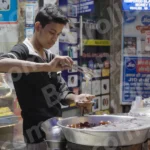 Boy Selling Gulab Jamun -Log, colour and B&W