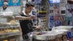 Boy Selling Gulab Jamun -Log, colour and B&W