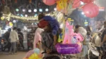 Man Selling Toys and Plying With Her Kid - Log, colour and B&W
