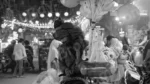 Man Selling Toys and Plying With Her Kid - Log, colour and B&W - Image 2
